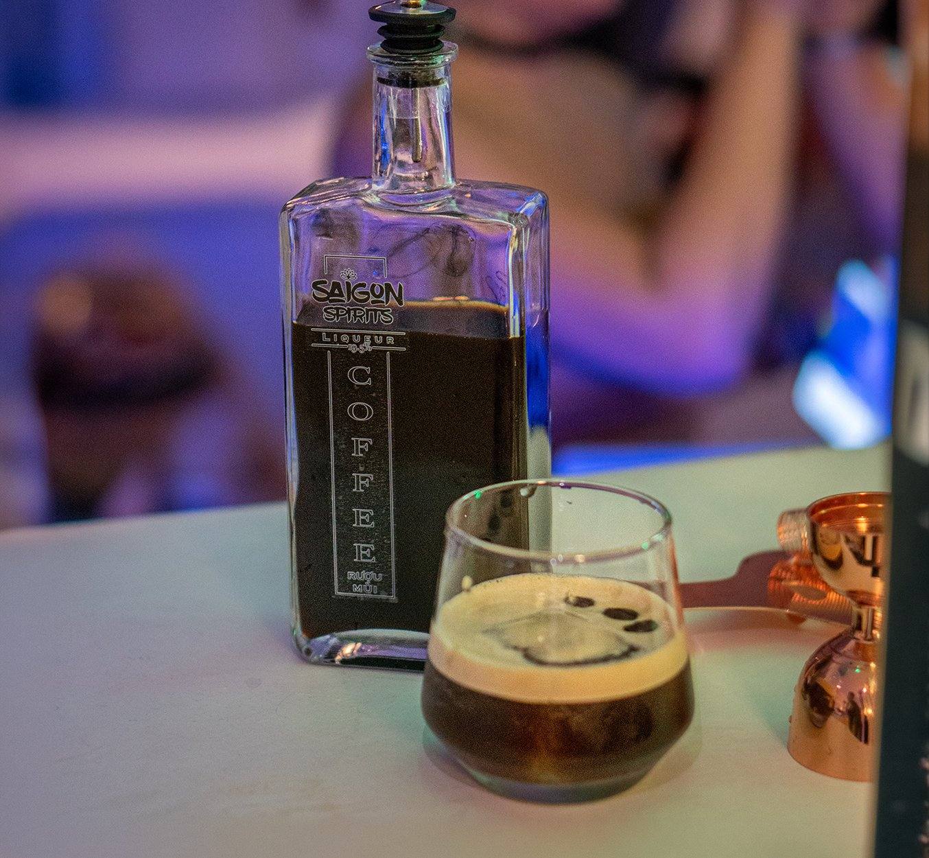 Coffee Orange Martini cocktail recipe Saigon Spirits Coffee Liqueur bottle Vietnam craft spirits neon bar Southeast Asia