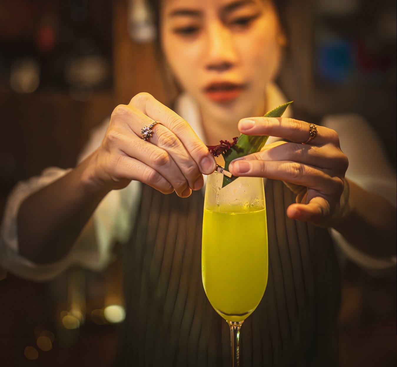 Pandan Dream cocktail recipe Pandan Liqueur Saigon Spirits bartender garnish flute glass Vietnam craft cocktail bar Southeast Asia