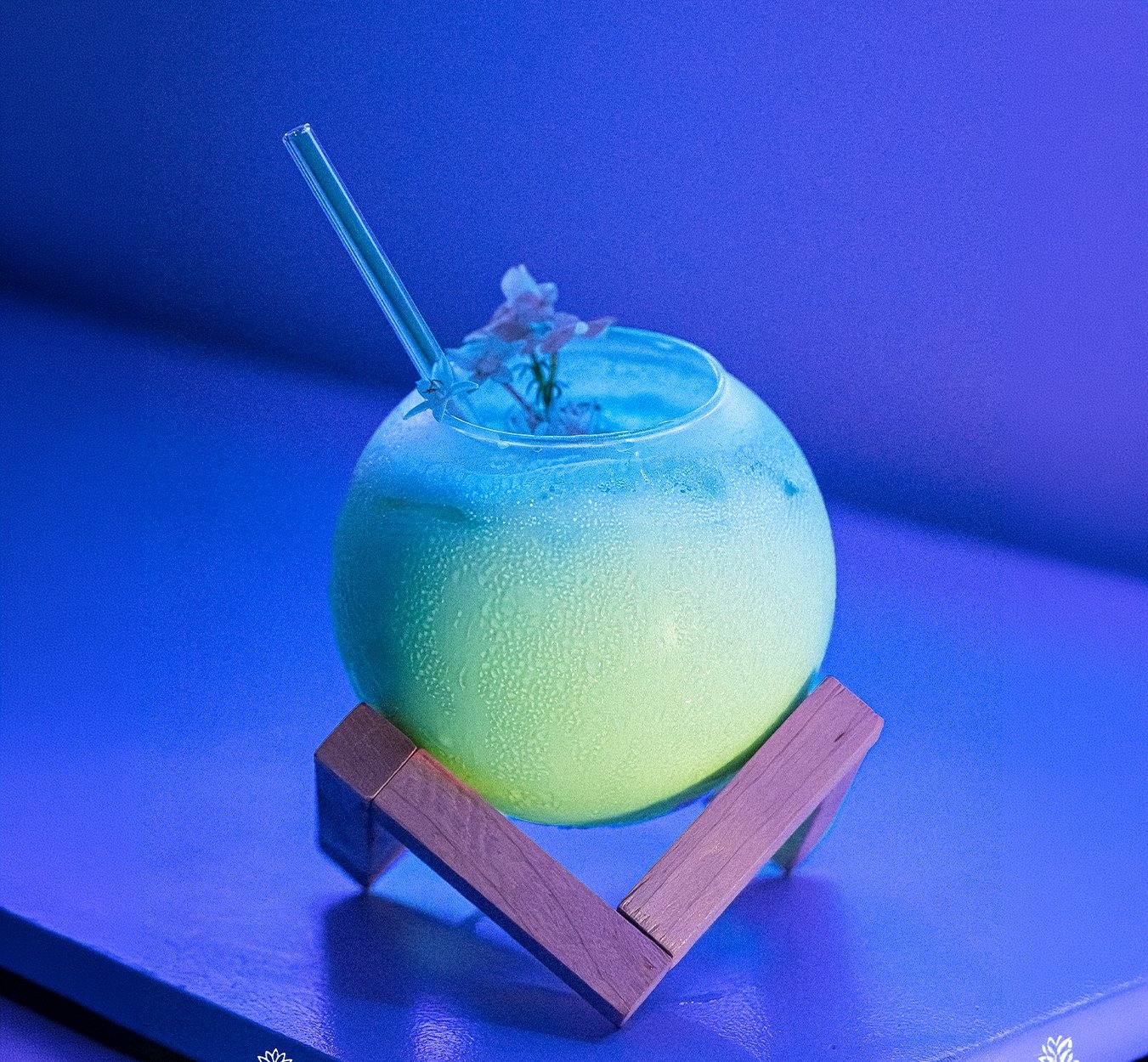 Saigon Moon cocktail recipe Pandan Liqueur Saigon Spirits blue globe sphere glass Vietnam creative cocktail Southeast Asia