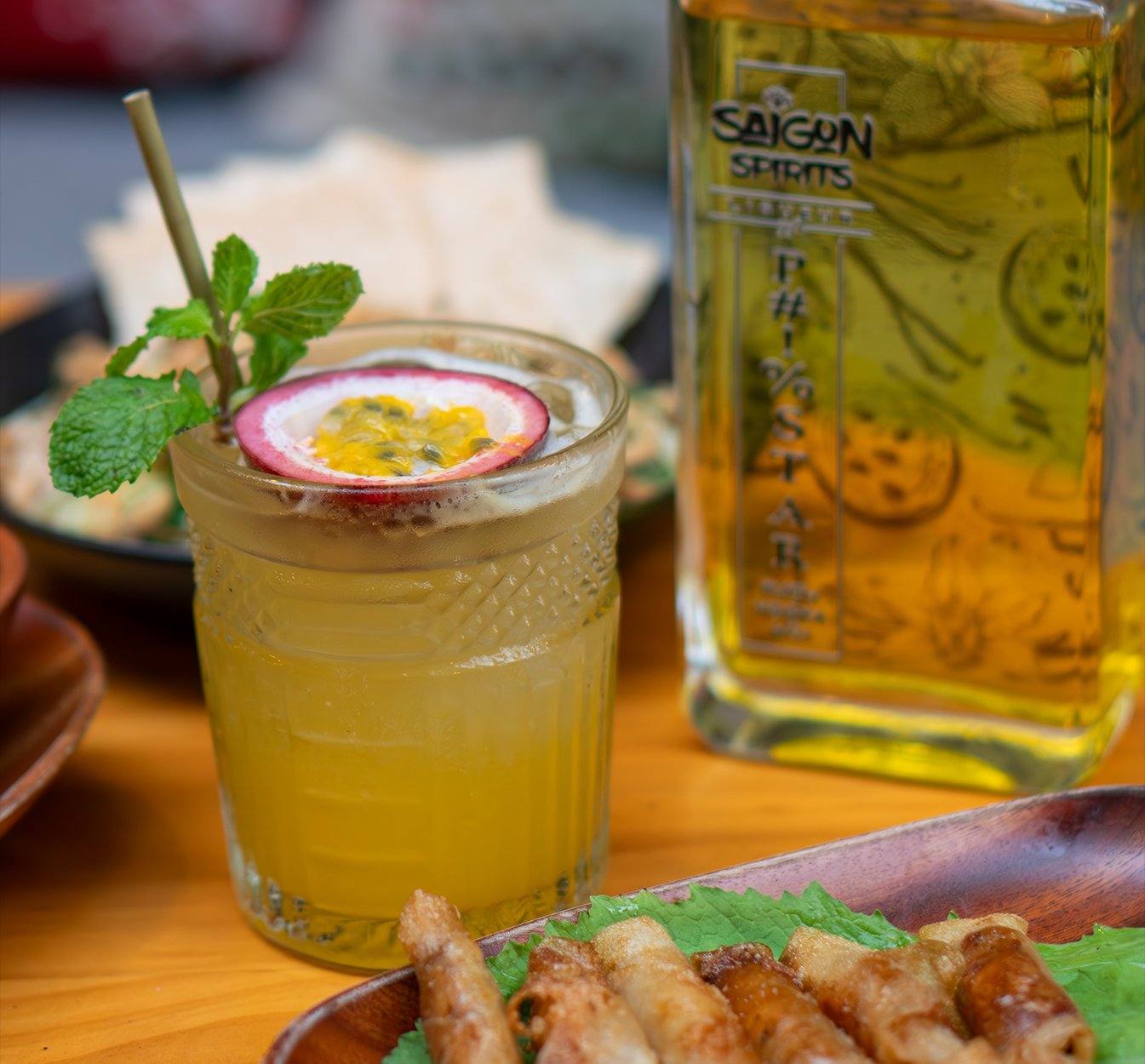 Pornstar Mojito cocktail recipe passion fruit liqueur foam coupe edible flowers Saigon Spirits Vietnam Southeast Asia